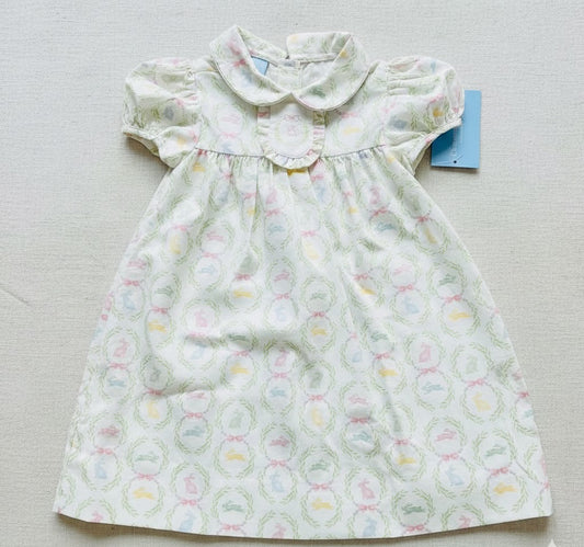 Children's dress with floral pattern on a light background