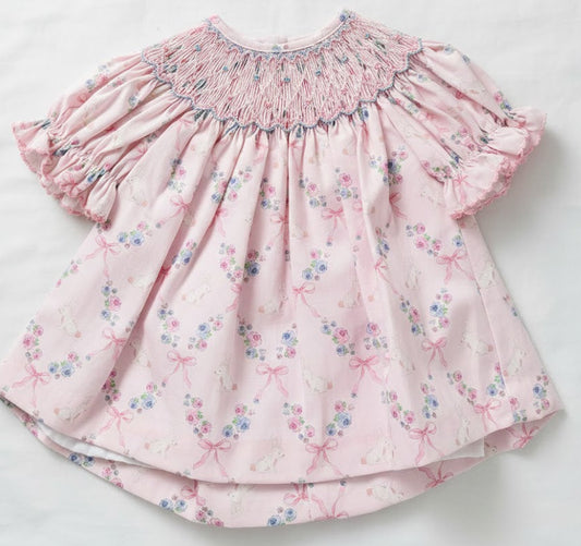 Pink floral dress on a white background